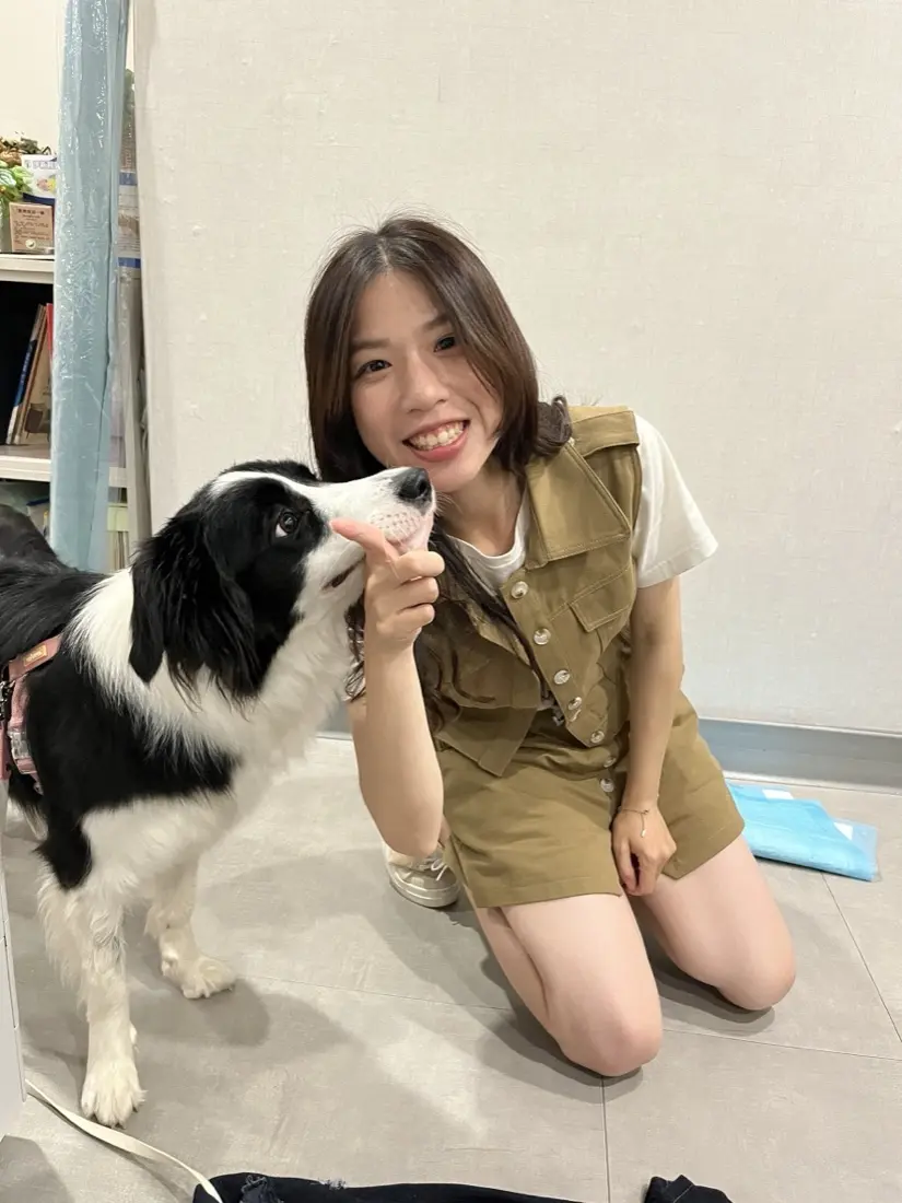狗狗訓練師羊桃與狗狗歐丁